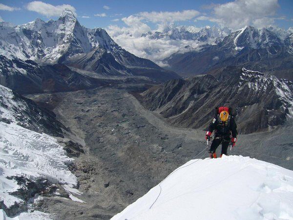 Corominas on Lhotse Shar, Ama Dablam in background