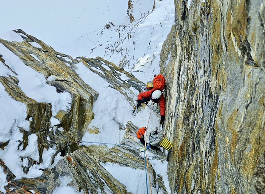 two climbers on a wall