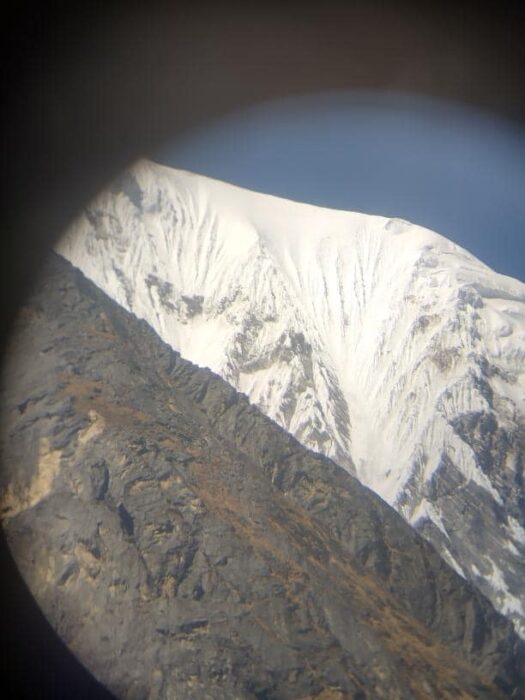 A section of Langtang Lirung's summit ridge, as seen from a telescope.