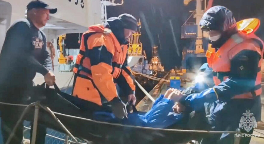 a man his hauled into a boat via stretcher