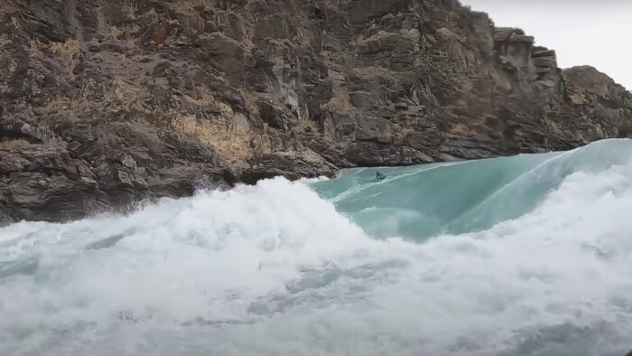 a huge rapid with a kayaker