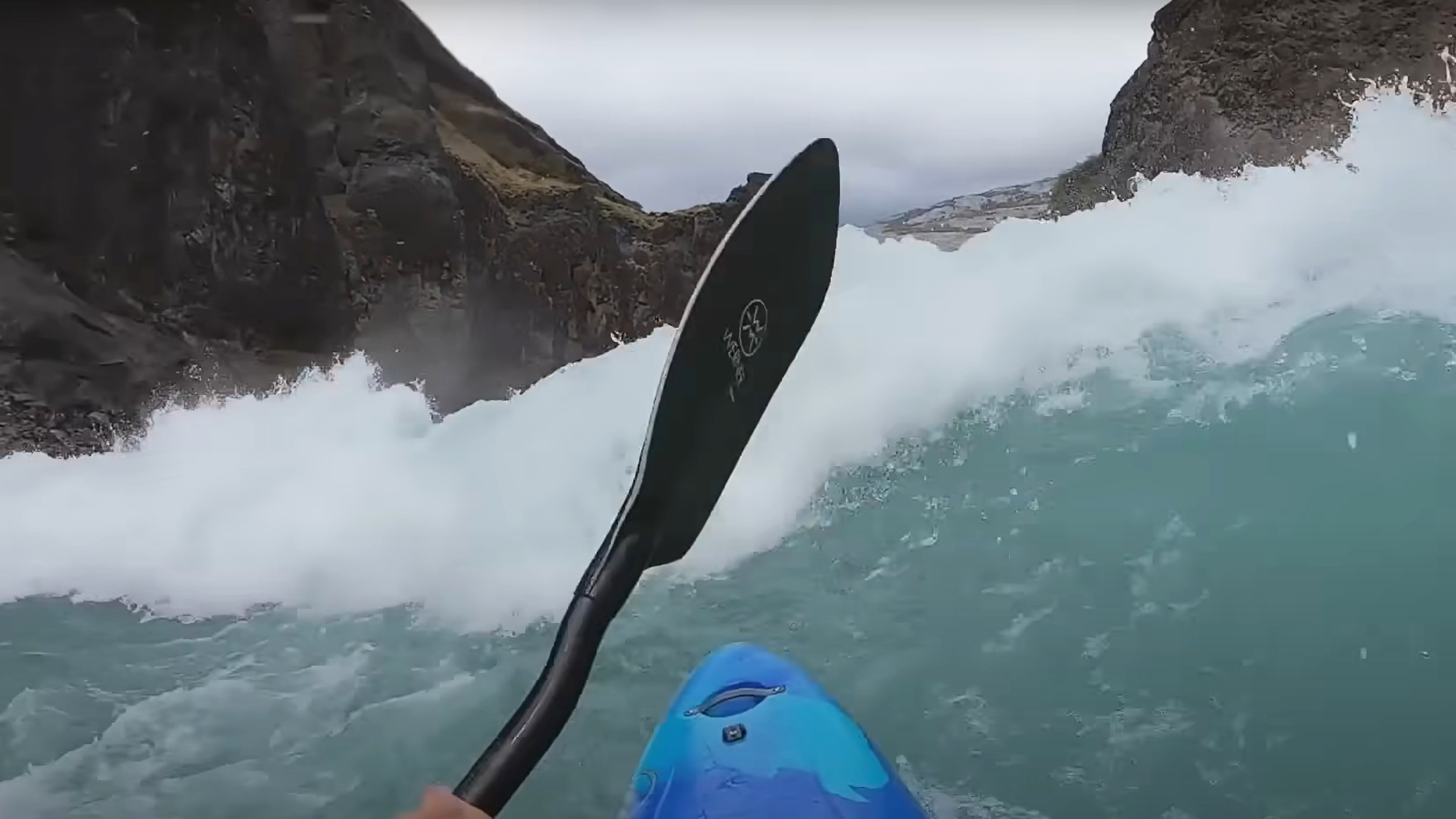 A kayakers POV about to run a wave