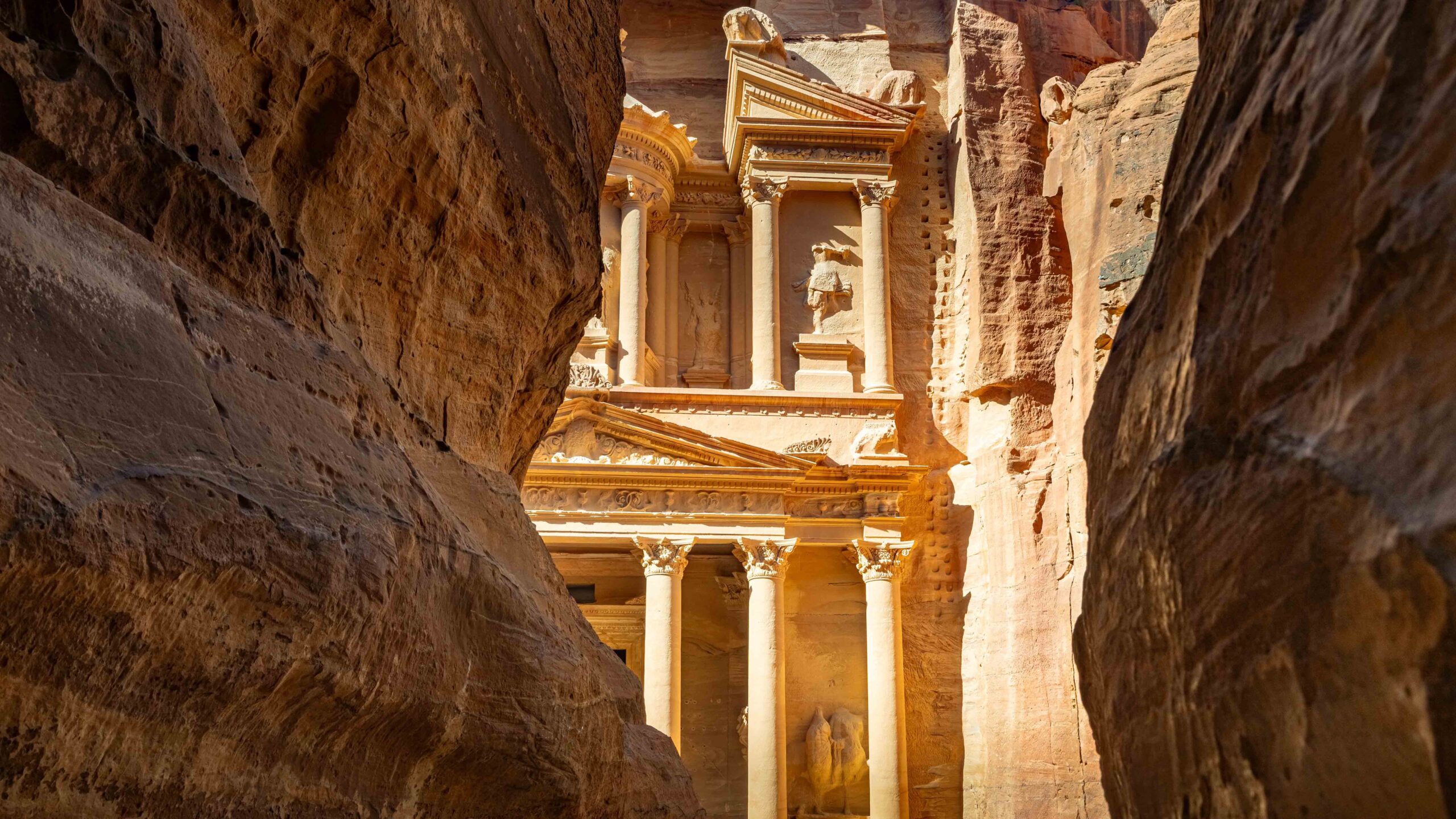 ancient ruins viewed through a gorge