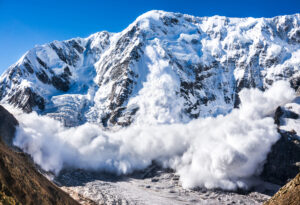 avalanche thundering down mountain