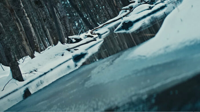 an off-kilter view of a frozen stream