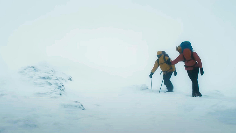 two hikers in a whiteout