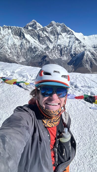 Fisher smiles on the summit of Ama Dablam. 