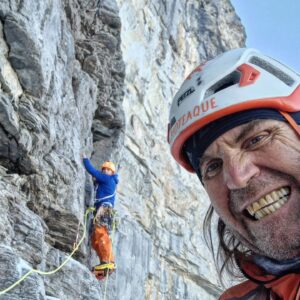 Huber takes a selfie at a traverse pitch on the north face of Eiger.