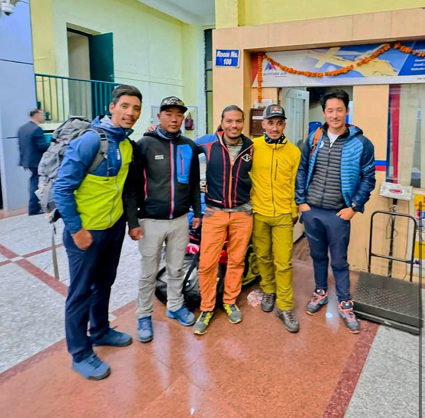 Nepalese climbers pose at the airport.