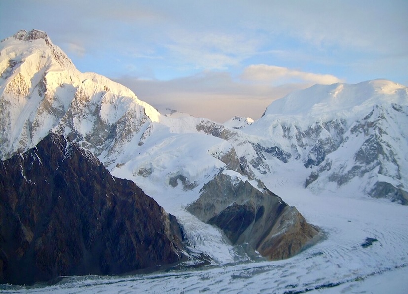 The south faces of Baltoro Kangri (left) and Sia Kangri (right) from the Kondus Gllacier. They are coonected by the Conway Saddle.