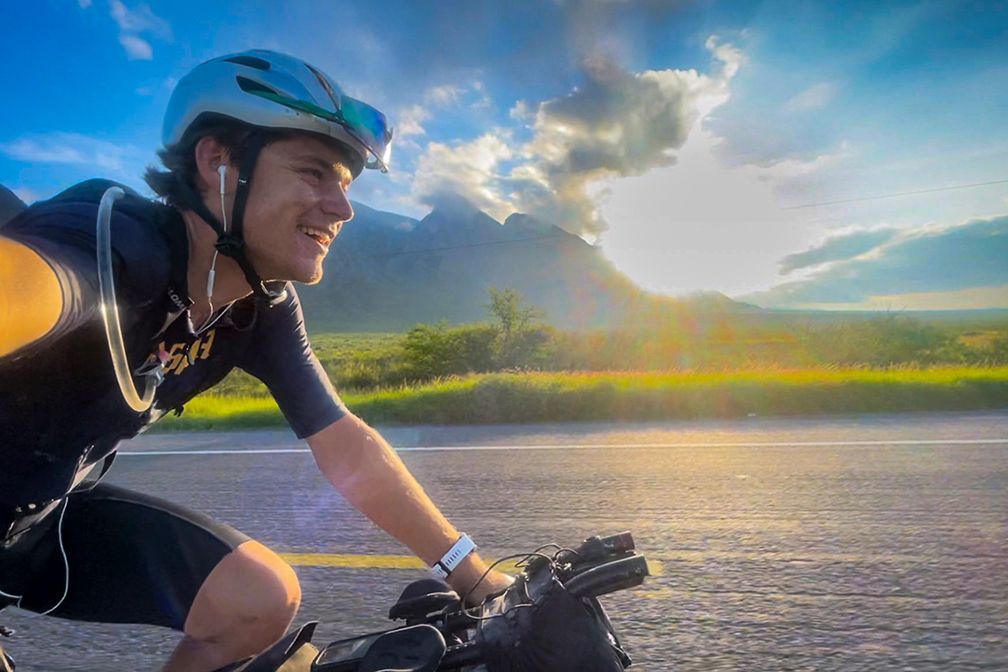 selfie of cyclist on the road at sunrise