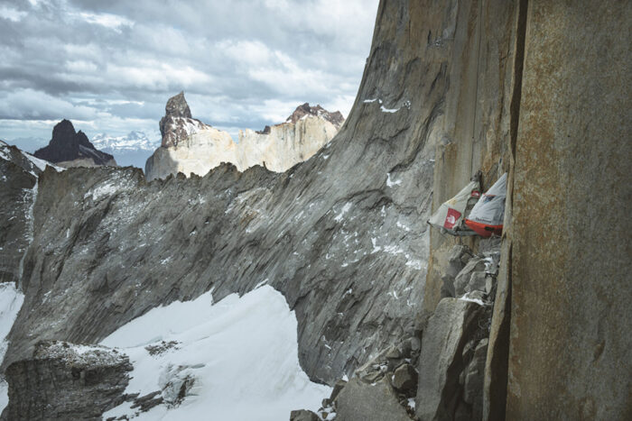 two portaledges fixed to the granite wall of Torre Central del Paine.