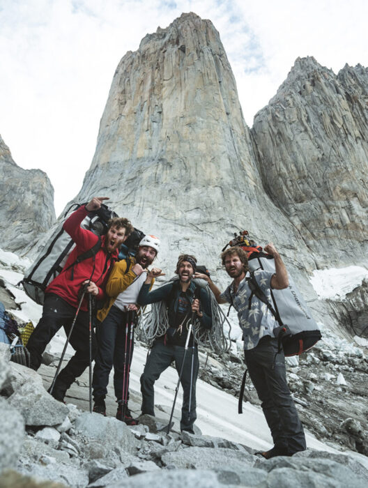 The climbers with heavy backpacks at the base of the Paine towers, in Patagonia.