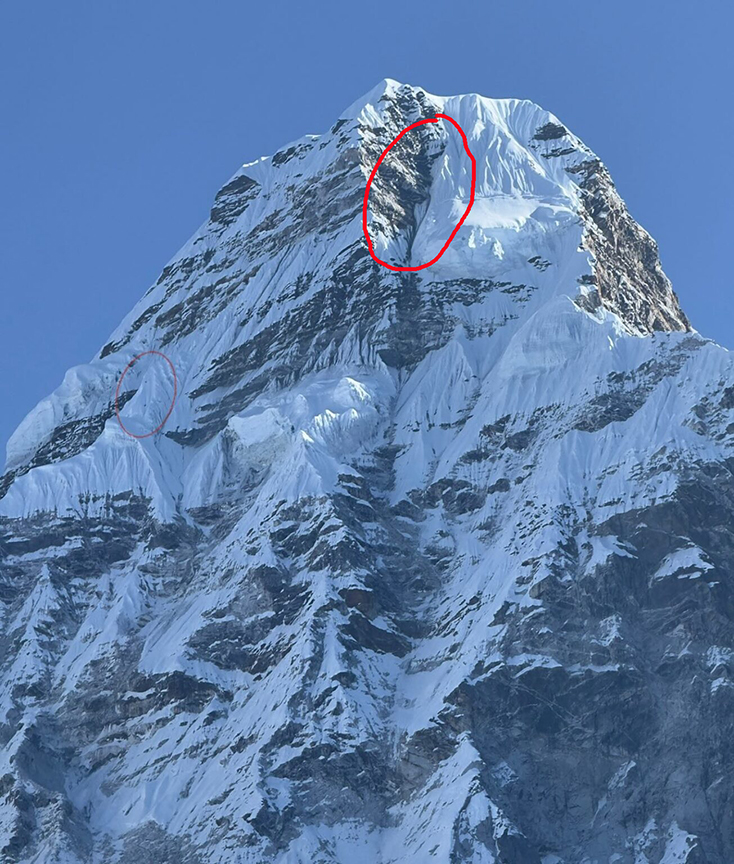 two dots marked on a photo of the west face of Ama Dablam.