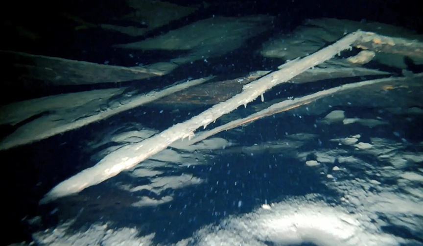 Parts of the wreck underwater.