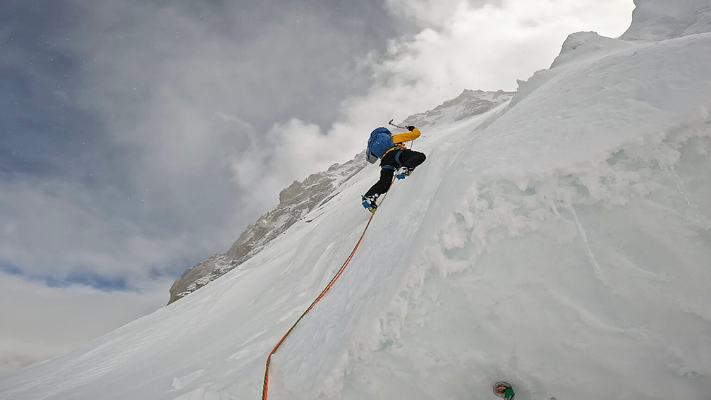 A climber on an icy slope