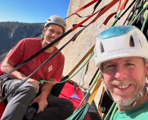 Herson and Caldwell on a portaledge pitched to a smooth grannite face on El Capitan