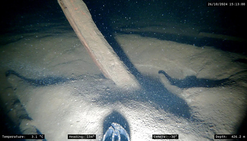 Part of the wreck sticking out from the lake bed.