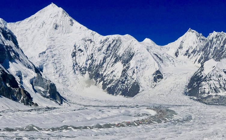 Gasherbrum Base Camp from the icefall. Chogolisa in the background.