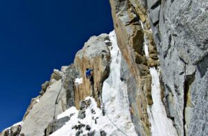 Kei Narita tackles thin ice and moves up a crack during the first day of climbing.