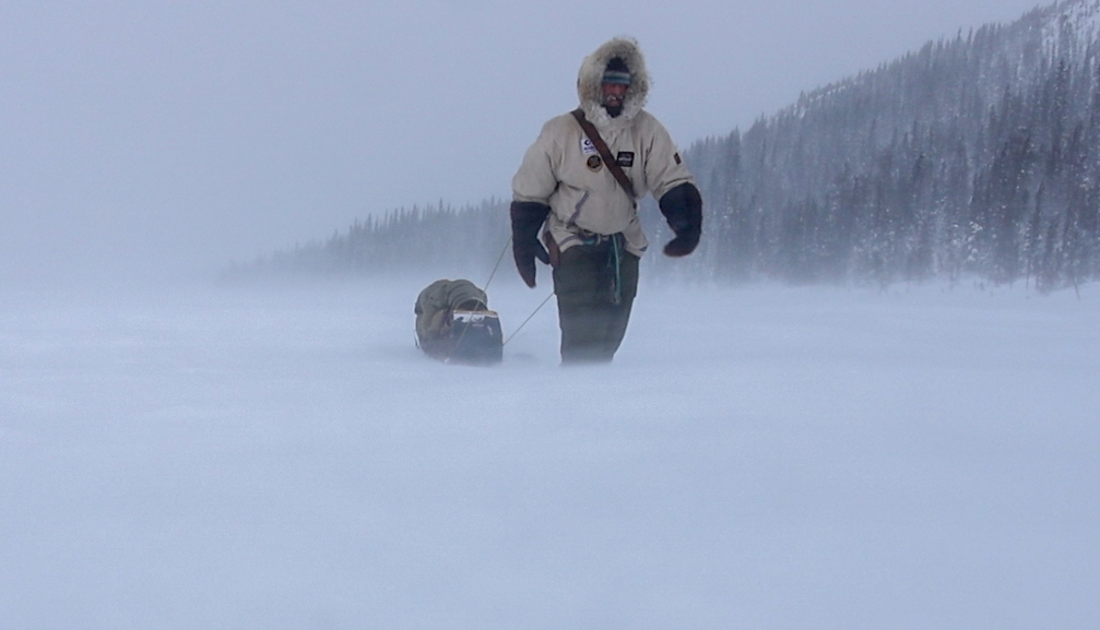 hauling a toboggan in a storm