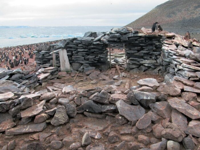 the remains of a stone hut