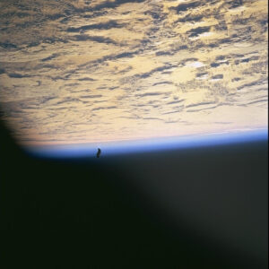 photo with black space below and the Earth above