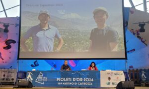 the stage of the Piolets dOr with Hiraide and Nakajima on the big screen