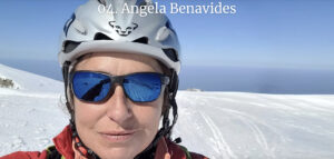 portrait of Angela Benavides in climbing helmet in snowy mountains