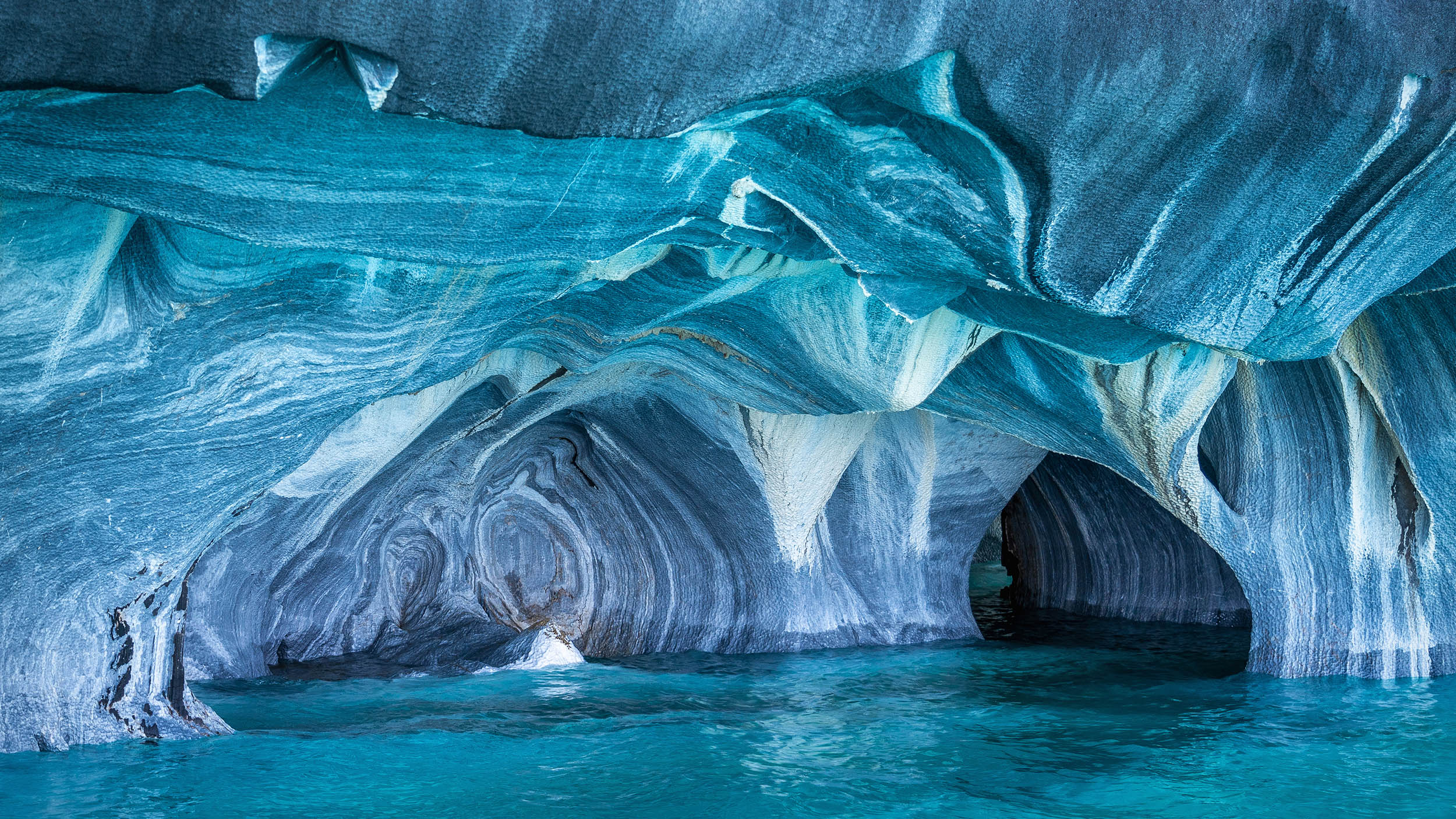 blue, green, and white cave formations