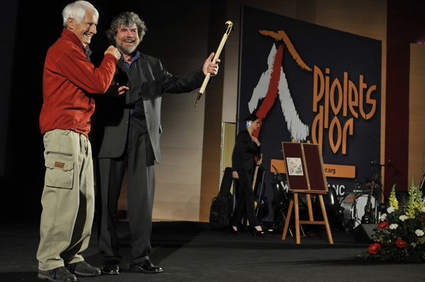 Bonatti and Messner at the Piolet dOr ceremony holding an award