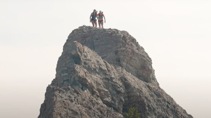 two women on a mountain peak