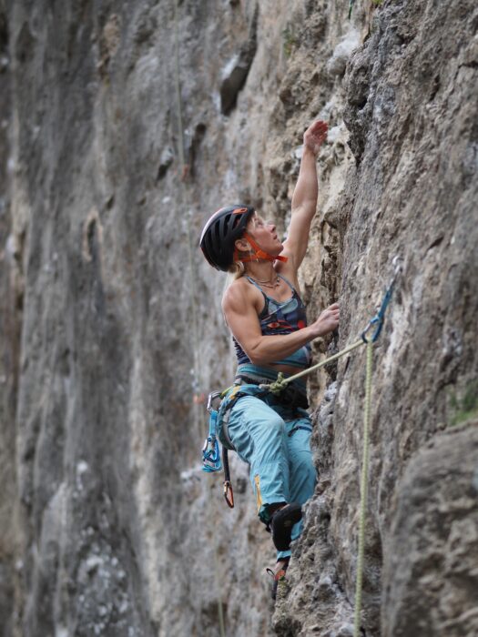 Priti Wright on a sport climbing route