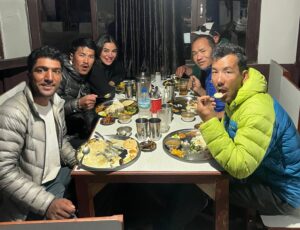 the climbers at dinner at a restaurant