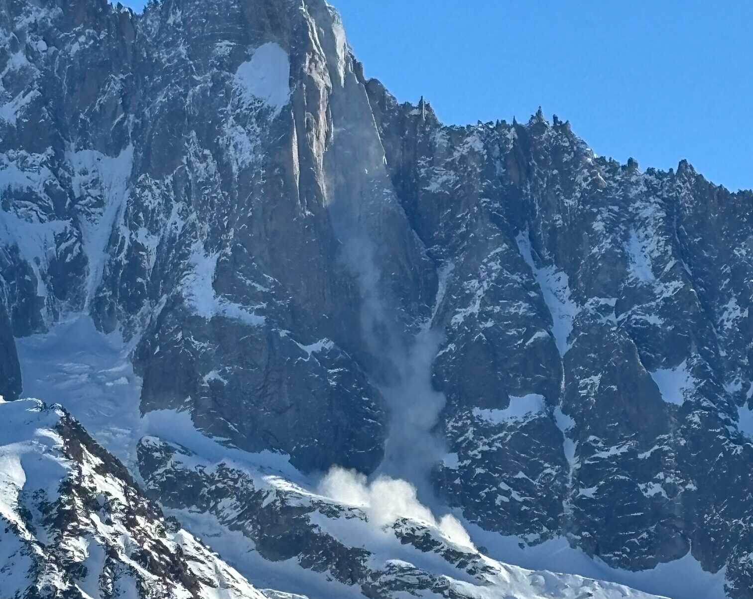 Rockfall down the west face of the Petit Dru