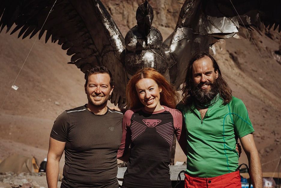 The climbers in front of the condor statue located at Plaza de Mulas, Aconcagua.