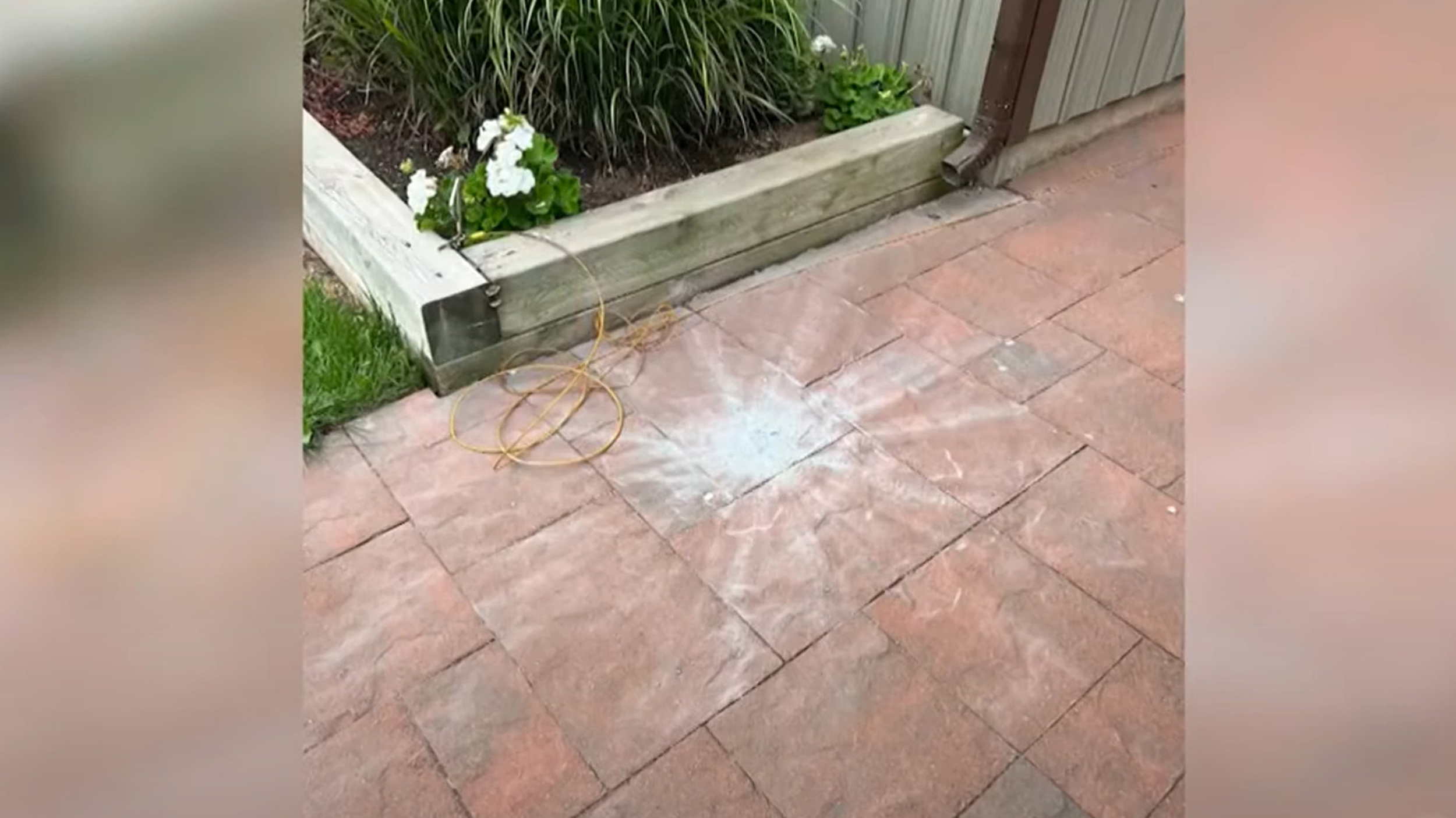 a brick walkway with a meteorite strike visible