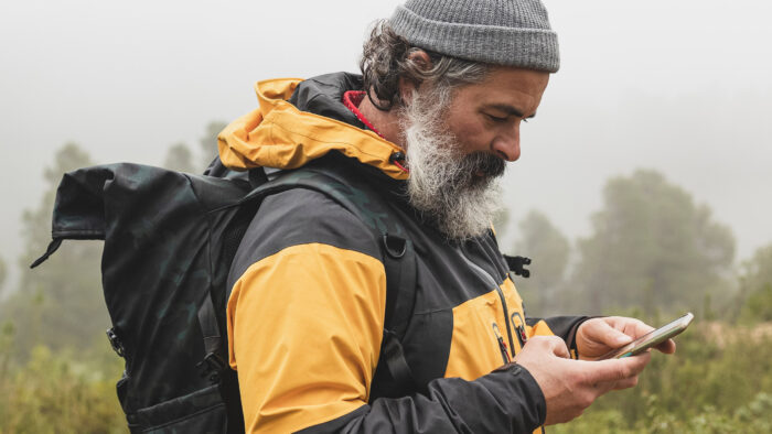 a man looks at his phone