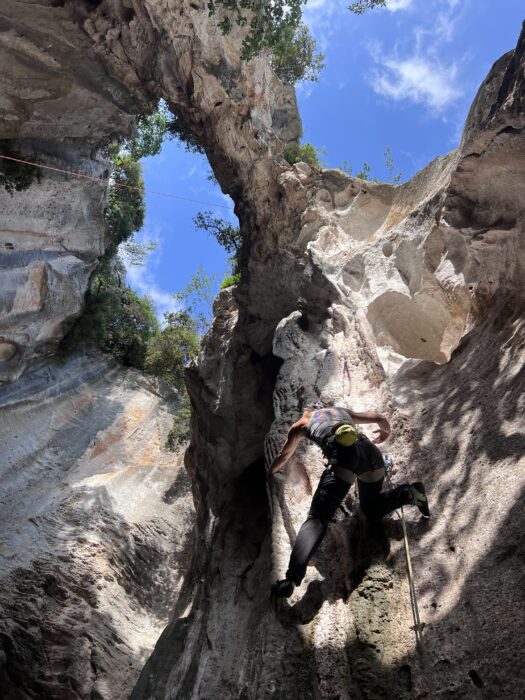 Priti Wright climbing strange rock formations