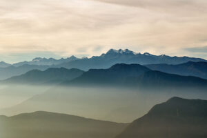 distant shadowed range showing Columbia's two highest peaks