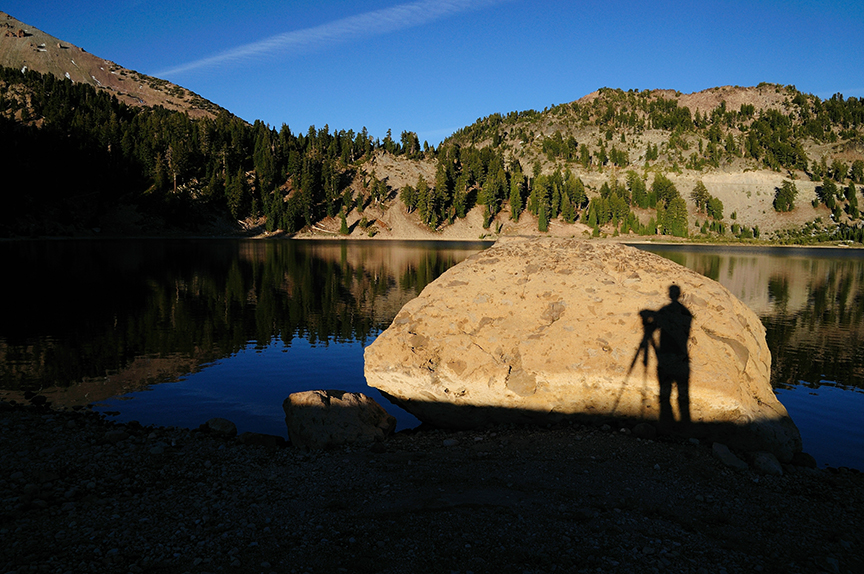 shadow of photographer with tripod