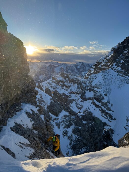 A climber on a jagged ridge in the Austrian Alps