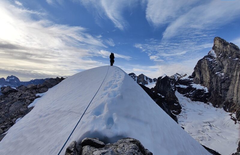 A climber during the first traverse of Baby Molar, Molar, and Incisor peaks