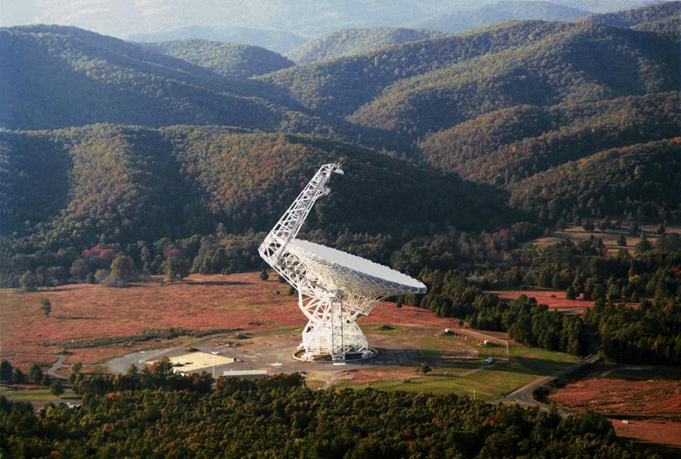 A telescope sits in the fall hills.