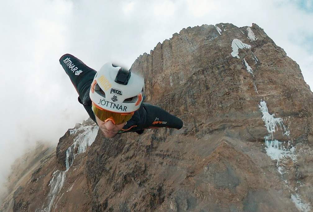 wingsuiter with mountain behind