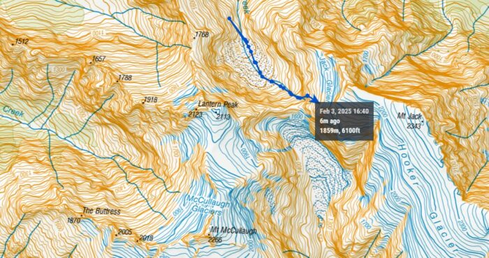 A tracker on a map of New Zeland's southern Alps