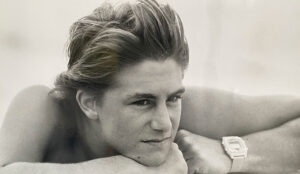 young black and white portrait of young surfer