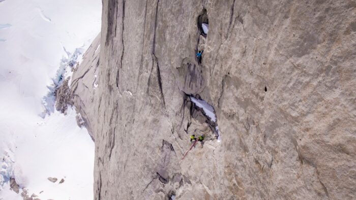 Climbers on a granite face in Patagonia