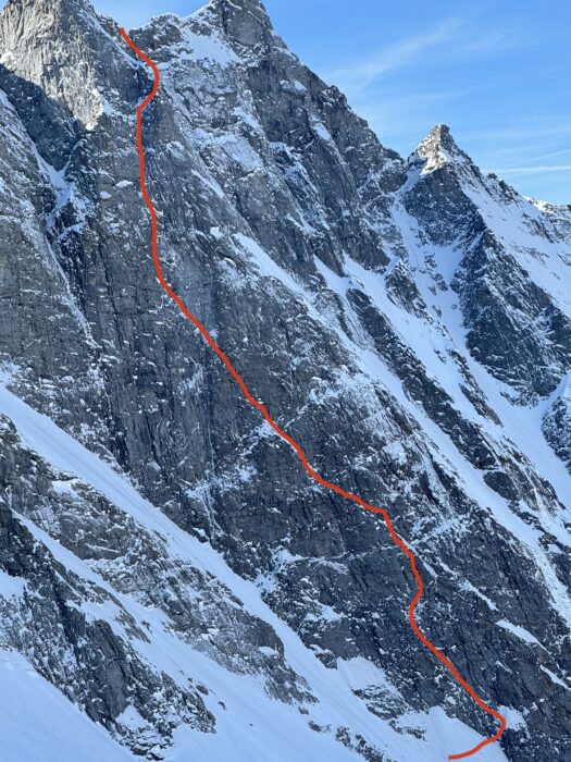 The diagonal route up a mixed face, marked in red