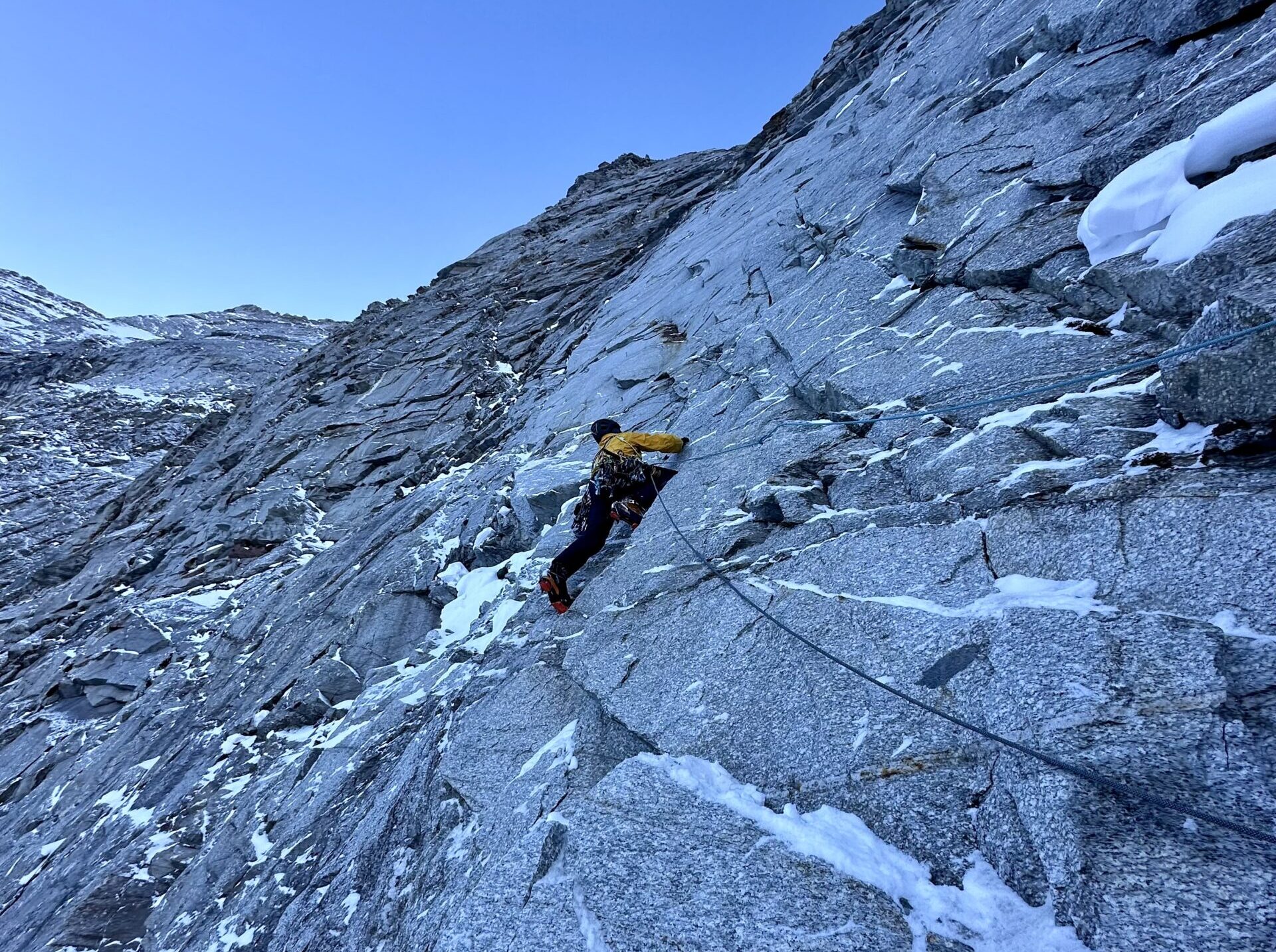 Martin Sieberer in dim light on a mixed north face in Tyrol, winter